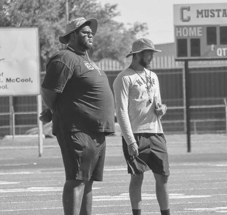 COACHING - Head Football Coach and Athletic Director Lyle Leong and Assistant Keith Dixon watched their team compete against Estacado and Coronado this Monday in Lubbock in 7 on 7. Coach Leong was also named Dave Campbell’s top 40 under 40 coaches in Texas. (Staff photo by Aalijah Soliz)