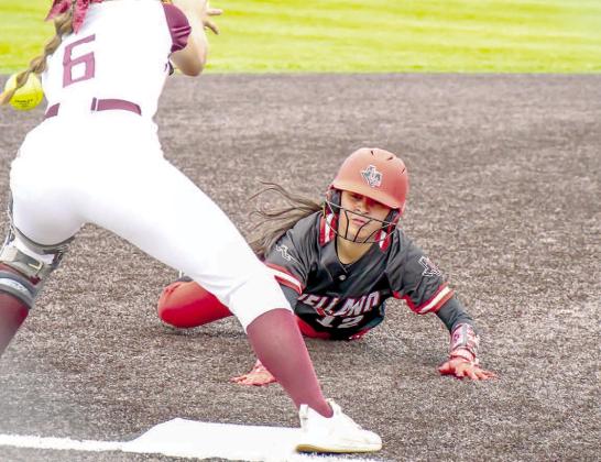 PICK PLAY- The Brownwood Lady Lions completed the sweep over the Levelland Loboettes at Abilene Cooper last weekend. The Loboettes ended their 2023 season 25-9. Loboette Jazlyn Diaz slid into first base head first on a pick-off play. (Staff Photo by Dom Puente)