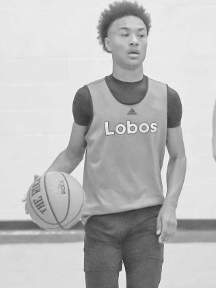 PUSHING THE BALL- Levelland Middle School hosted summer league basketball games Thursday. The Lobos rolled out the welcome mats for Olton and Littlefield. Lobo Bryson Golightly is pictured pushing the ball up the sideline. (Staff Photo by Aalijah Soliz)