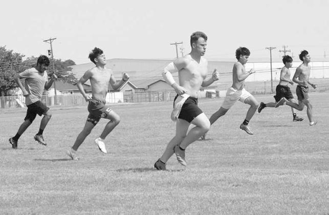 CONDITIONING- Levelland Lobo football players got some extra conditioning with sprints during summer workouts earlier this week. The Lobos will be in Lubbock Monday, June 26th for seven-on-seven action at Lubock High. The varsity team will take the field at 5:30 pm (Staff Photo by Aalijah Soliz)