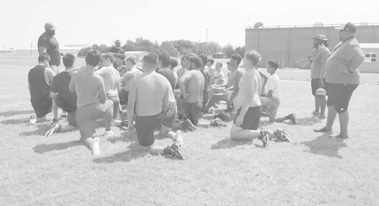 TAKE A KNEE - Levelland ISD is holding summer workouts for the athletes that play football and the incoming freshman to get a feel for high school athletics. (Staff Photo by Aalijah Soliz)