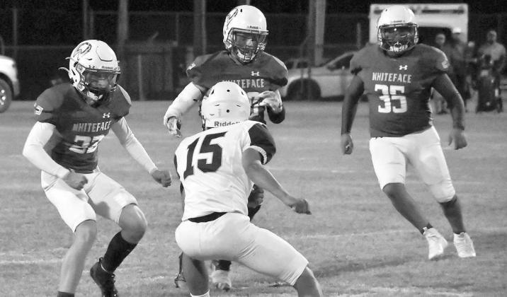 NOWHERETOHIDE- Gavin Baker, Jaxon Heflin and Damien Castenada surrounded a Meadow runner in a 64-6 home win for the Whiteface Antelopes over the Broncos in UIL Class 1A-1 high school football action last Thursday. The Antelopes will travel to O’Donnell on Friday to play for the Region II, District 5 championship. (Photo Courtesy of Jay Kelley)