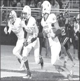 A LITTLE HELP- Jeremias Chavez had a little help from Auscar Gandara (15) and Jeremiah Soliz (42) on a kick return in a 62-36 Whiteface Antelope road win over the O’Donnell Eagles last Friday. The Antelopes are UIL Class 1A-1 Region II, District 5 champions and will face Van Horn in the bi-district playoff round in Rankin on Friday at 6 p.m. (Photo Courtesy of Jay Kelley)