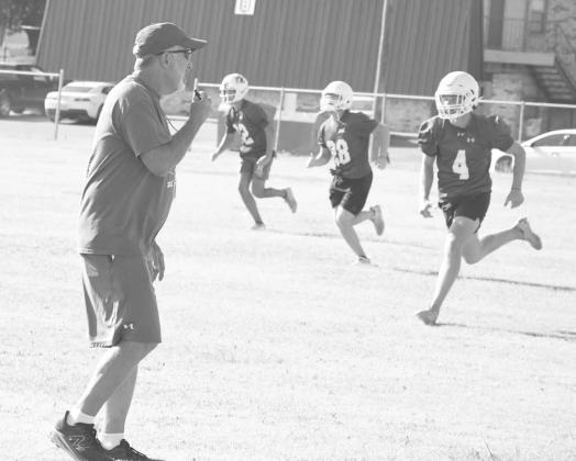 SPC CAMP- Midland Christian Head Football Coach Chris Cunningham put his players through their paces Tuesday in the final workout of the Mustangs’ annual football camp at South Plains College. The Mustangs are a Division II school in the (TAPPS) Texas Association of Private and Pariochial Schools. (Photo Courtesy of Jay Kelley)