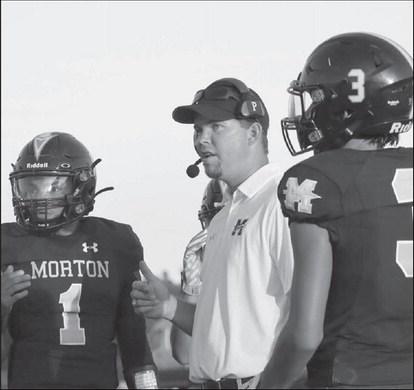 COACHING - Morton Head Football Coach and Athletic Director Keith Mauldin talked to his team during a timeout to get them focused. (Staff photo by Aalijah Soliz)
